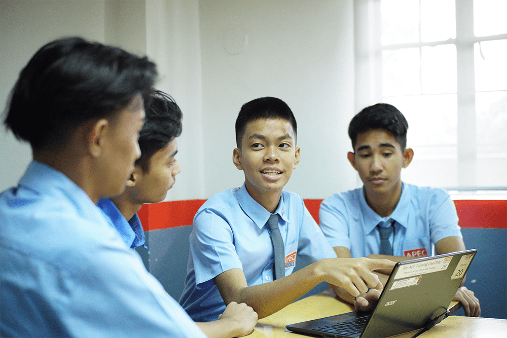 APEC Schools students using a Chromebook